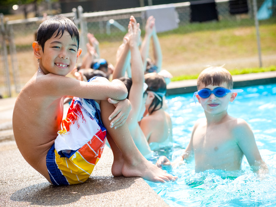 boy-sitting-by-pool