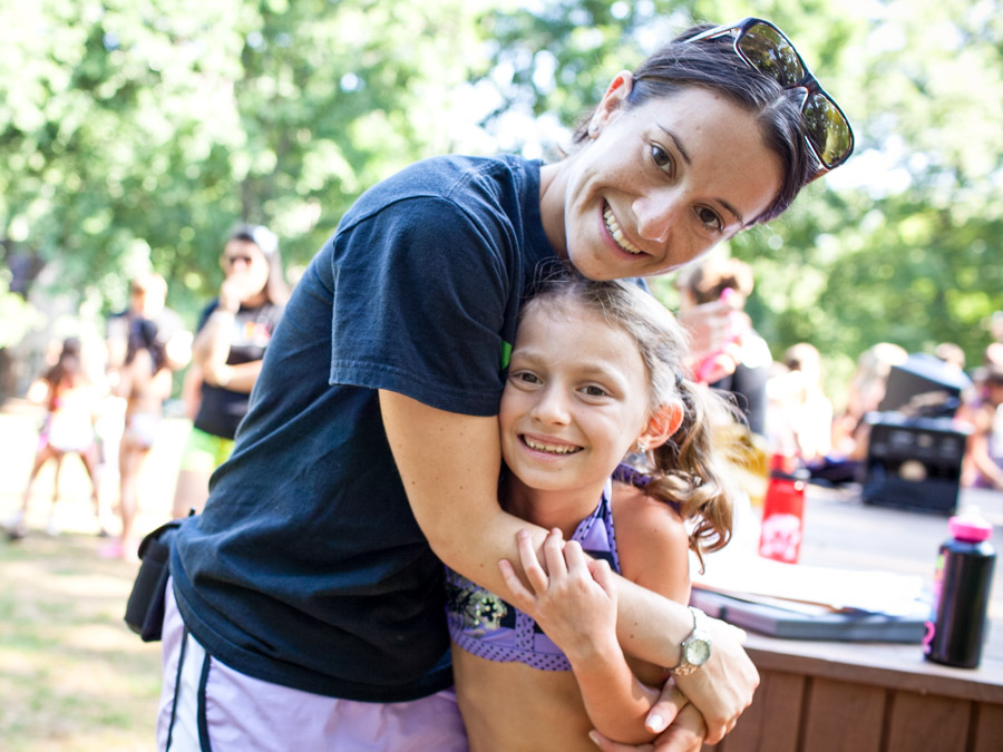 staff-and-girl-hugging